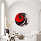Abstract, acrylic and mixed-media 47” print on a round canvas with curved-edges shown on a white wall in a contemporary living room with arches above.