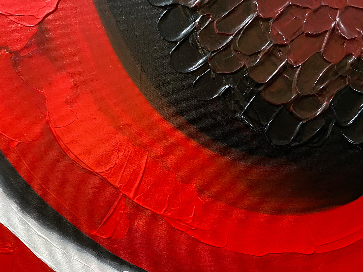 Abstract, acrylic and mixed-media painting close-up 2. texture paste, red, black, grey, and white acrylic paint on round canvas with curved-edges