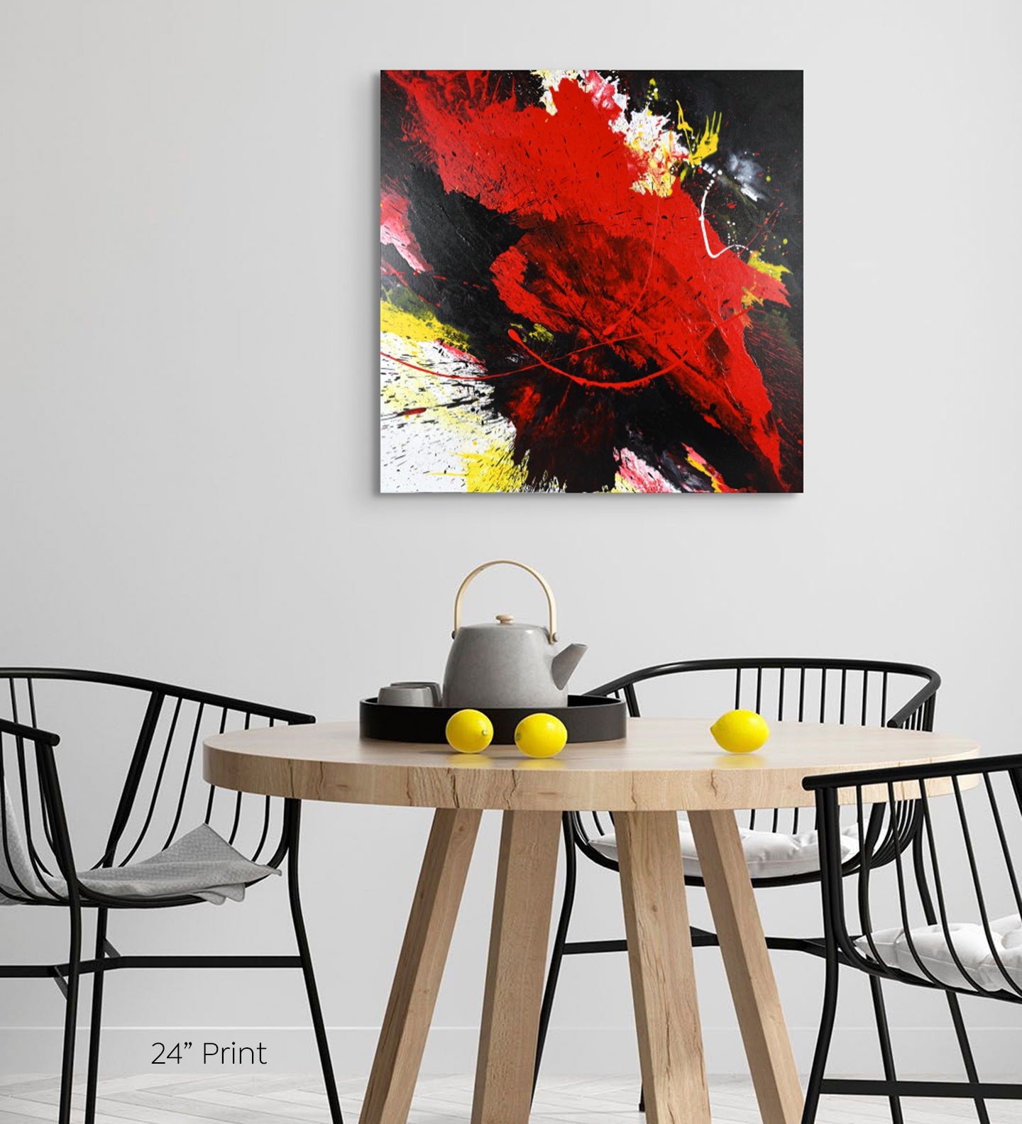 Abstract, expressionism, acrylic 24” giclee print: tumultuous explosion of bright red, black, yellow and white on a pale grey wall over a dining room table and chairs.