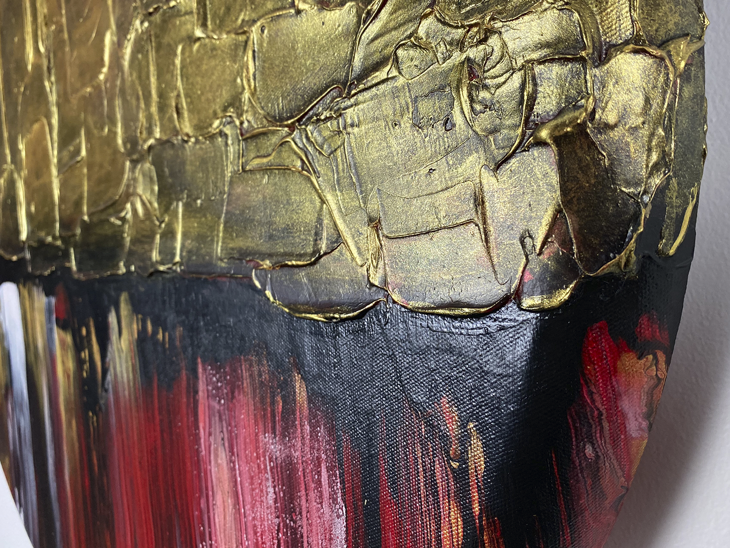 Abstract, acrylic and mixed-media painting at a different angle 1. Texture paste, gold foil with black, red, white and gold acrylic paint on round canvas with curved-edges
