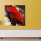 Abstract, expressionism, acrylic 40” giclee print: tumultuous explosion of bright red, black, yellow and white on a yellow wall in a retro modern living room over a long low sideboard.